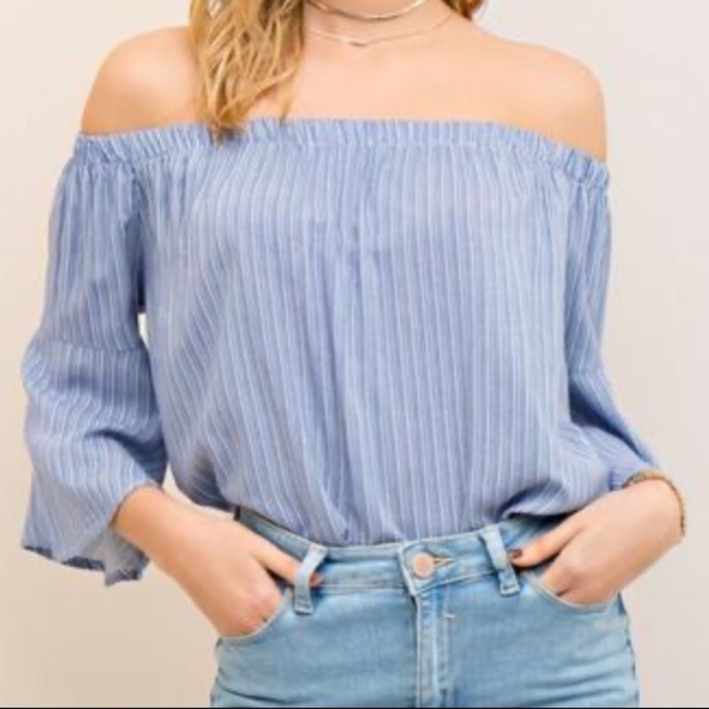 Blush striped off the shoulder shirt.
